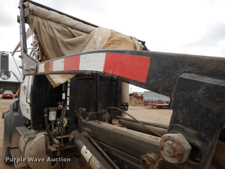 image for item DI8010 1999 Sterling Acterra  roll-off container truck