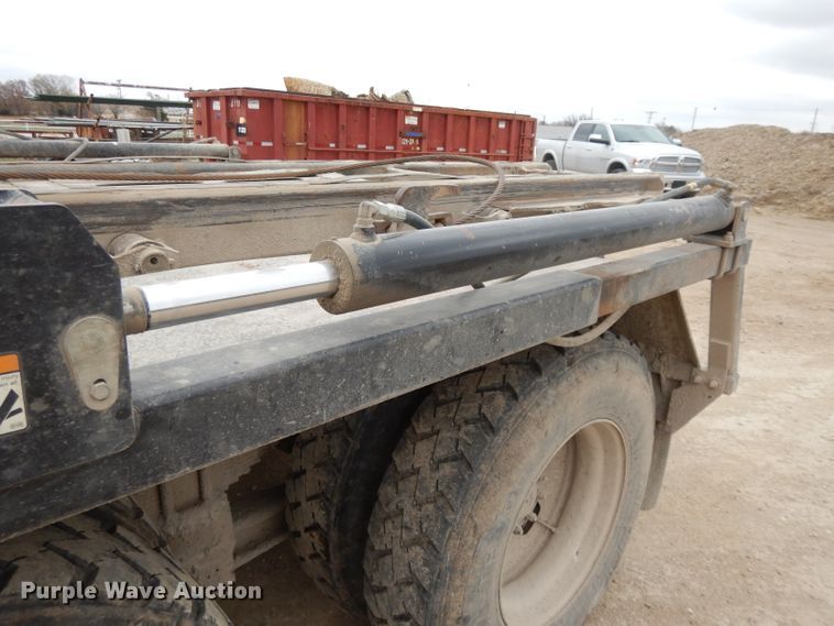 image for item DI8010 1999 Sterling Acterra  roll-off container truck