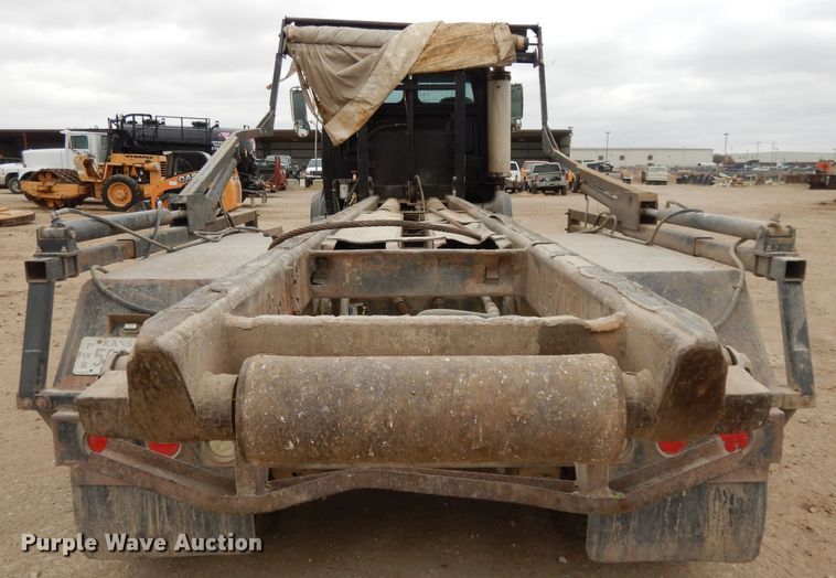 image for item DI8010 1999 Sterling Acterra  roll-off container truck