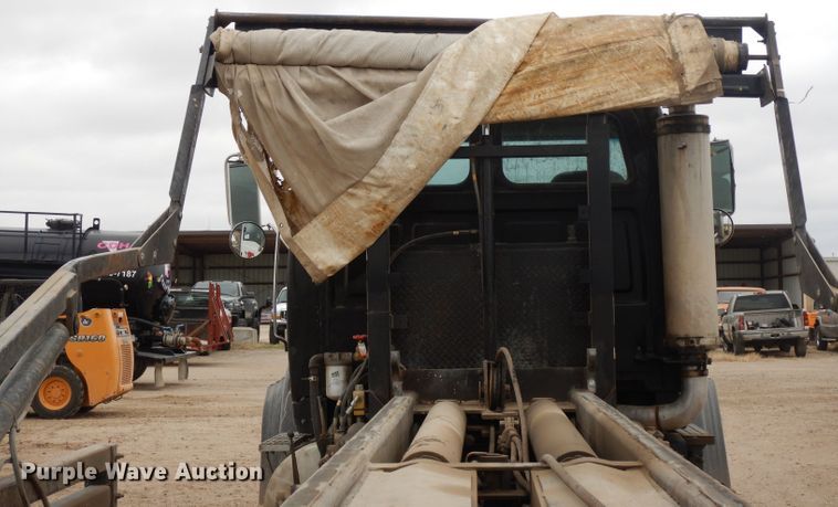 image for item DI8010 1999 Sterling Acterra  roll-off container truck