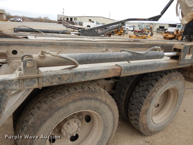 image for item DI8010 1999 Sterling Acterra  roll-off container truck