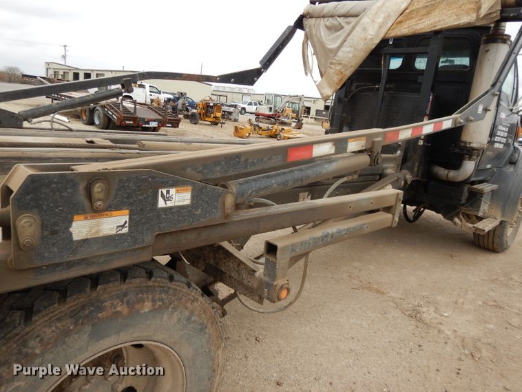 image for item DI8010 1999 Sterling Acterra  roll-off container truck