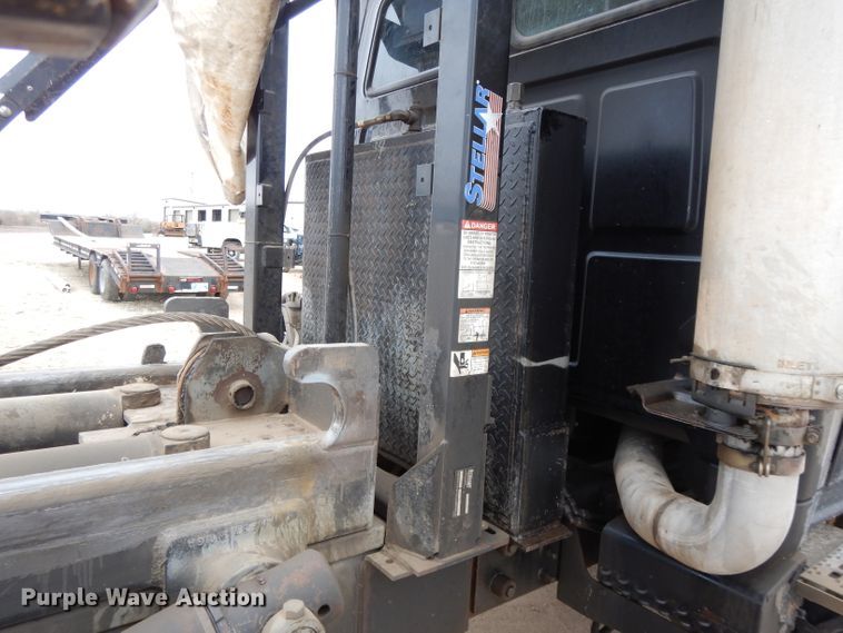 image for item DI8010 1999 Sterling Acterra  roll-off container truck