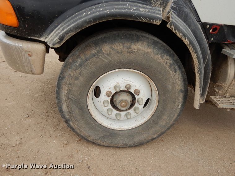 image for item DI8010 1999 Sterling Acterra  roll-off container truck