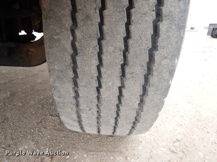 image for item DI8010 1999 Sterling Acterra  roll-off container truck