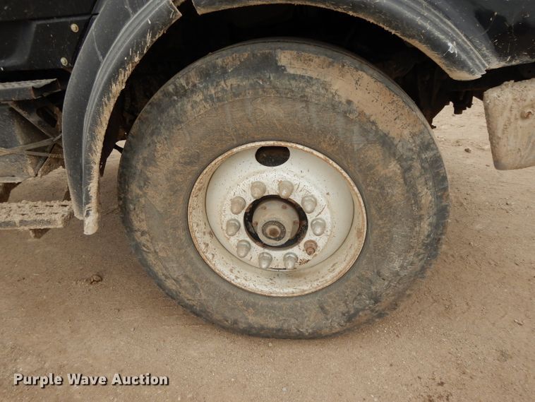 image for item DI8010 1999 Sterling Acterra  roll-off container truck