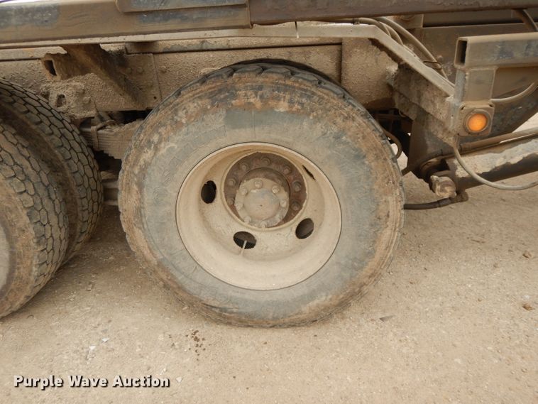 image for item DI8010 1999 Sterling Acterra  roll-off container truck