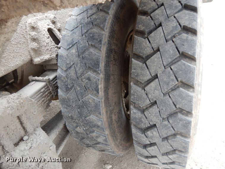 image for item DI8010 1999 Sterling Acterra  roll-off container truck