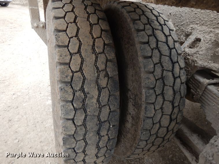 image for item DI8010 1999 Sterling Acterra  roll-off container truck