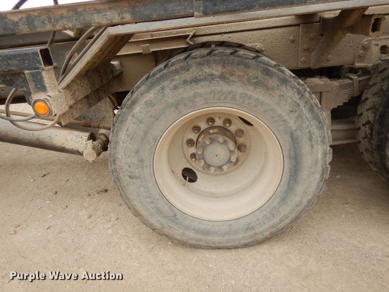 image for item DI8010 1999 Sterling Acterra  roll-off container truck