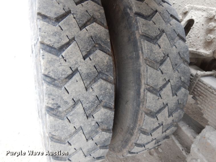 image for item DI8010 1999 Sterling Acterra  roll-off container truck