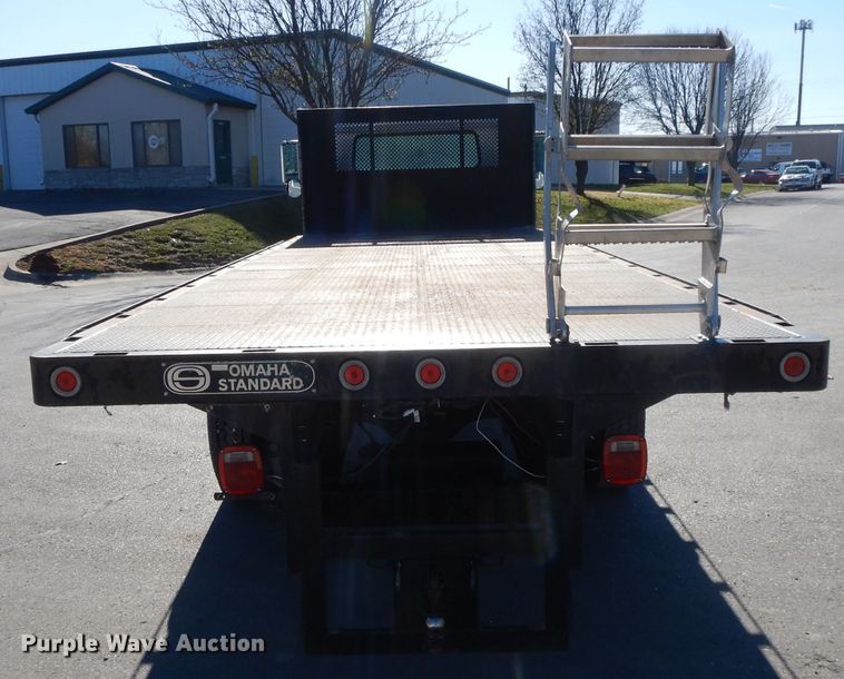 image for item DI8090 2000 International 4700  flatbed truck