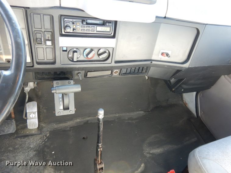 image for item DI8090 2000 International 4700  flatbed truck