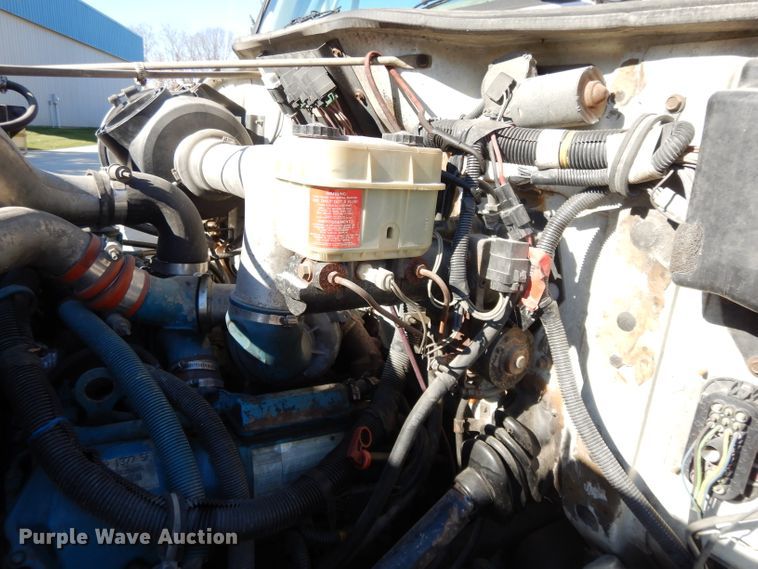 image for item DI8090 2000 International 4700  flatbed truck