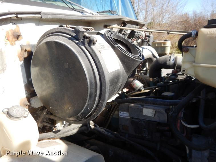 image for item DI8090 2000 International 4700  flatbed truck