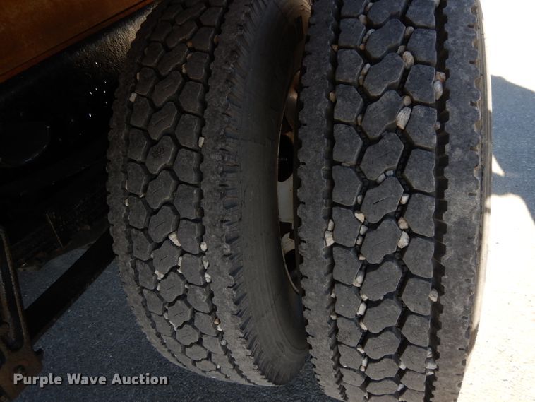 image for item DI8090 2000 International 4700  flatbed truck