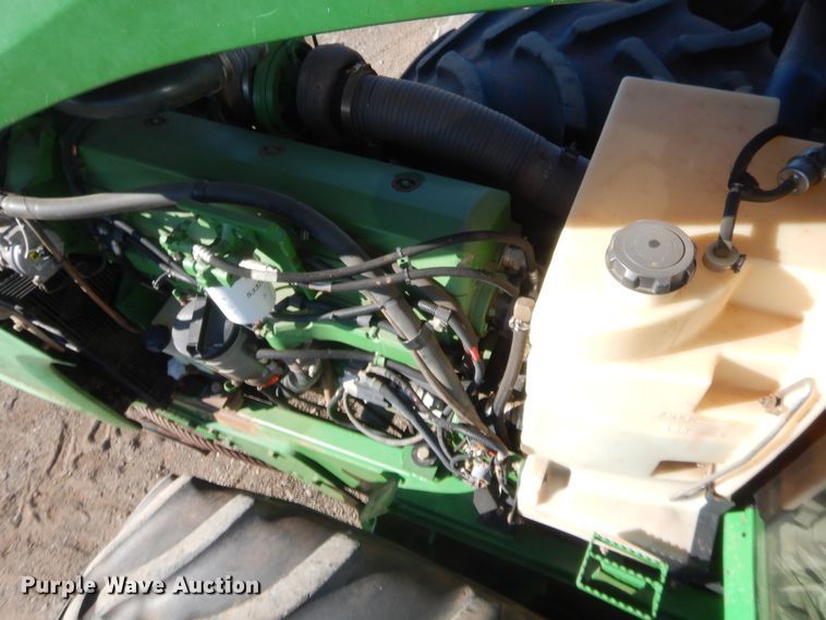 image for item DJ2082 2006 John Deere 9520  Scraper Special 4WD tractor