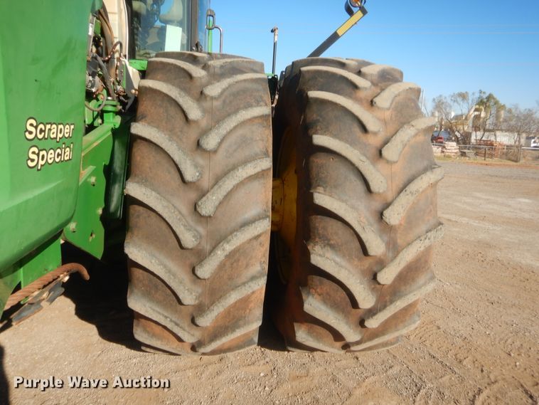 image for item DJ2082 2006 John Deere 9520  Scraper Special 4WD tractor