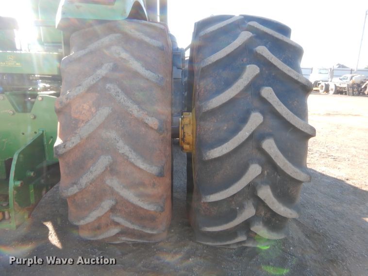 image for item DJ2082 2006 John Deere 9520  Scraper Special 4WD tractor