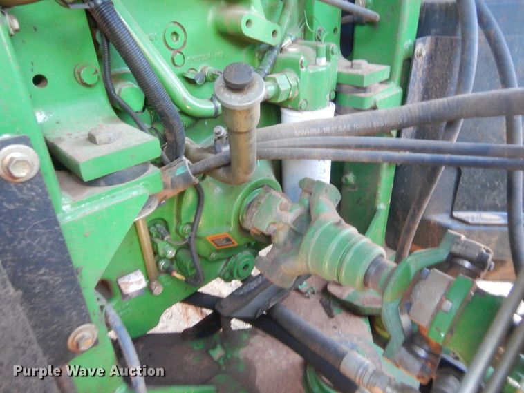 image for item DJ2082 2006 John Deere 9520  Scraper Special 4WD tractor