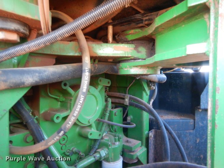 image for item DJ2082 2006 John Deere 9520  Scraper Special 4WD tractor