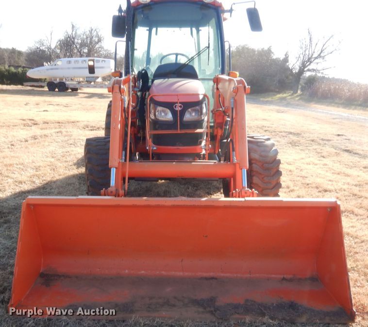 image for item DJ2114 2013 Kubota M7040D  MFWD tractor