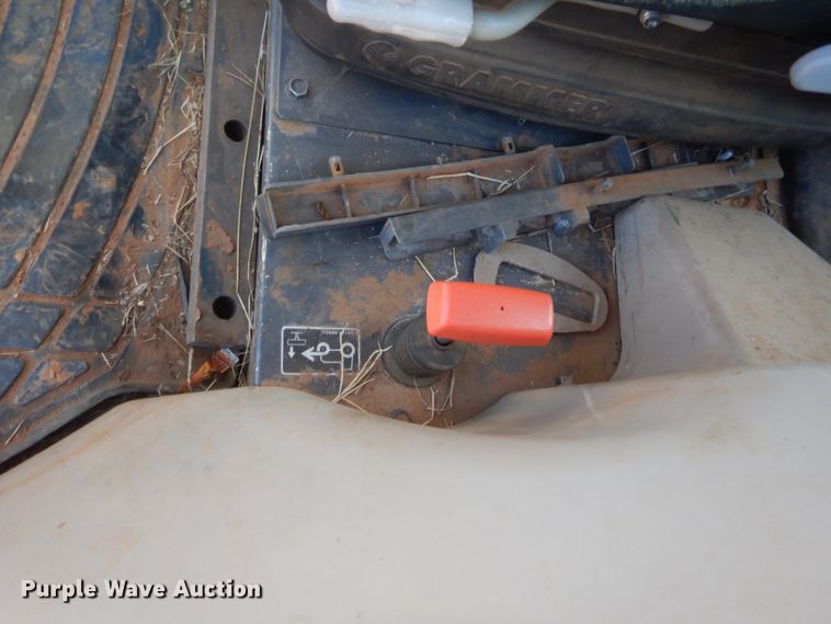 image for item DJ2114 2013 Kubota M7040D  MFWD tractor