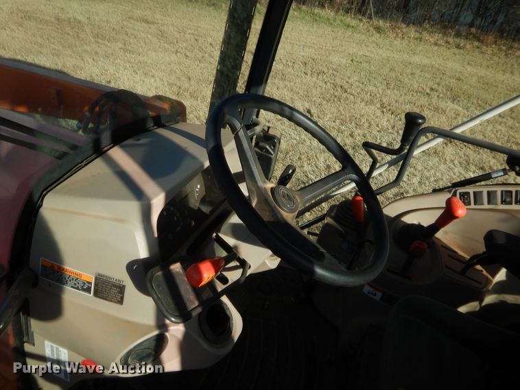 image for item DJ2114 2013 Kubota M7040D  MFWD tractor