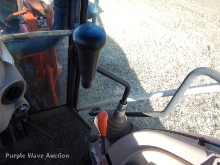 image for item DJ2114 2013 Kubota M7040D  MFWD tractor