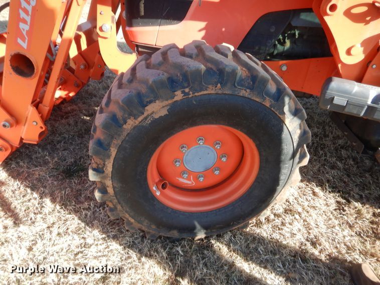 image for item DJ2114 2013 Kubota M7040D  MFWD tractor