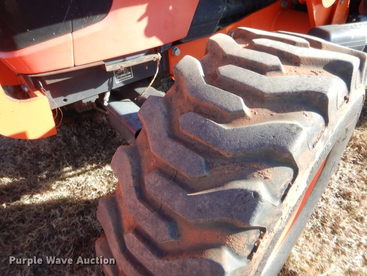 image for item DJ2114 2013 Kubota M7040D  MFWD tractor