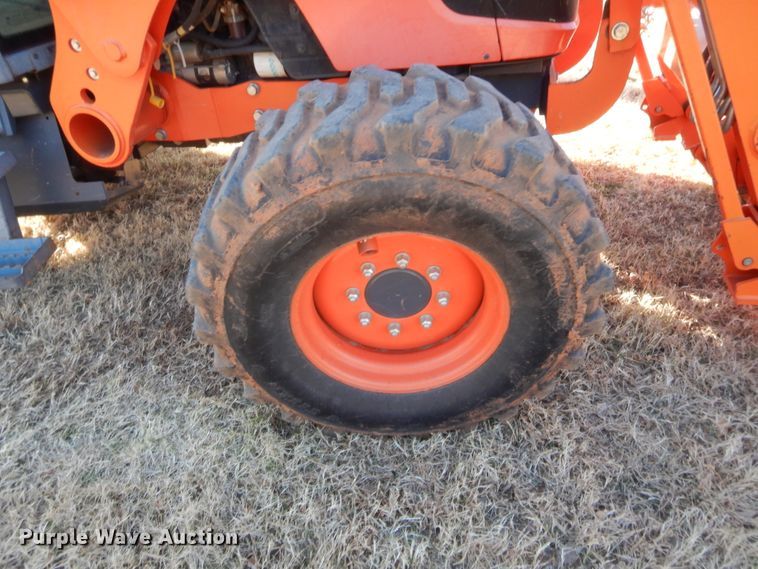 image for item DJ2114 2013 Kubota M7040D  MFWD tractor