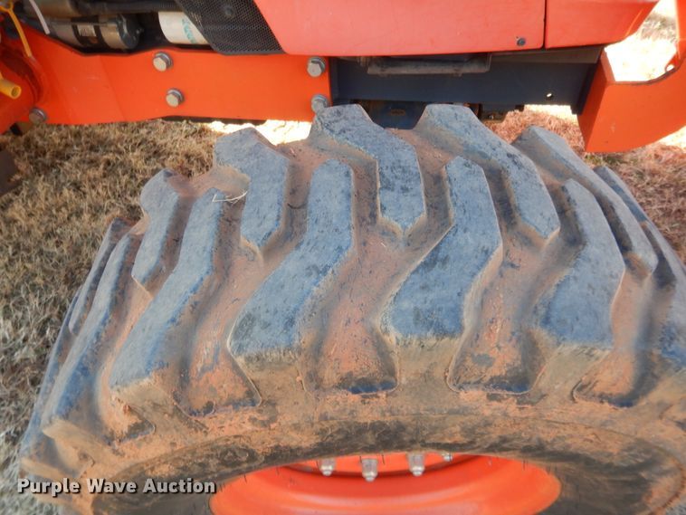 image for item DJ2114 2013 Kubota M7040D  MFWD tractor