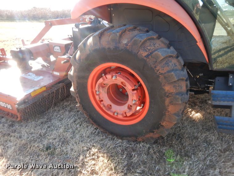 image for item DJ2114 2013 Kubota M7040D  MFWD tractor