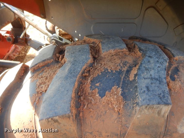 image for item DJ2114 2013 Kubota M7040D  MFWD tractor