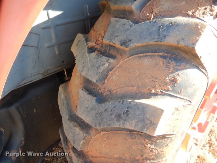 image for item DJ2114 2013 Kubota M7040D  MFWD tractor