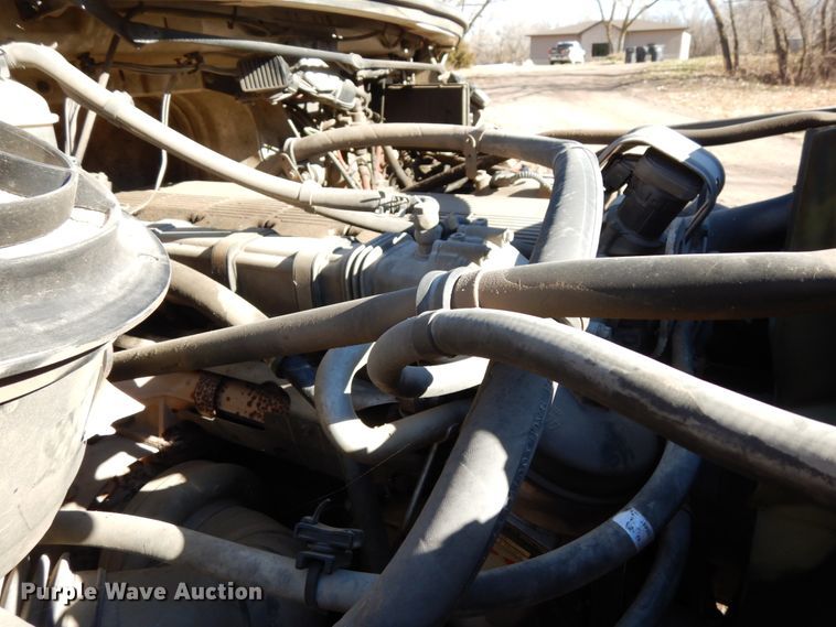 image for item DJ5821 2007 Freightliner Business Class M2  roll-off container truck