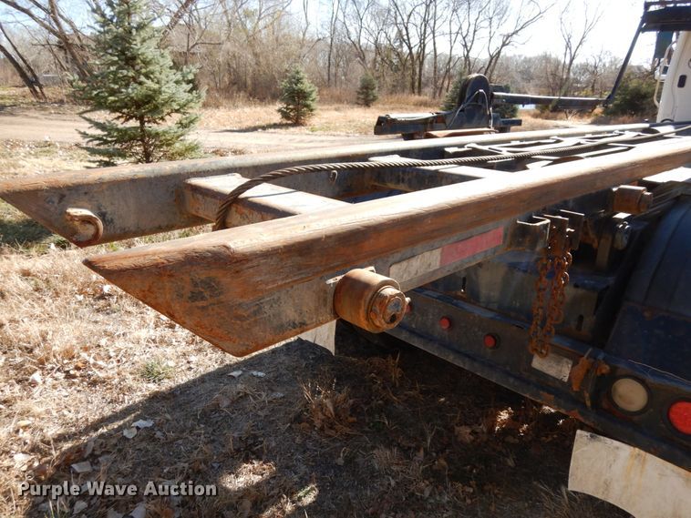 image for item DJ5821 2007 Freightliner Business Class M2  roll-off container truck