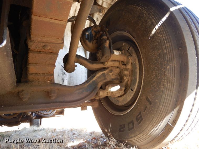 image for item DJ5821 2007 Freightliner Business Class M2  roll-off container truck