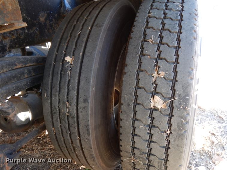 image for item DJ5821 2007 Freightliner Business Class M2  roll-off container truck