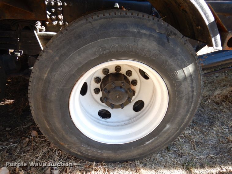 image for item DJ5821 2007 Freightliner Business Class M2  roll-off container truck