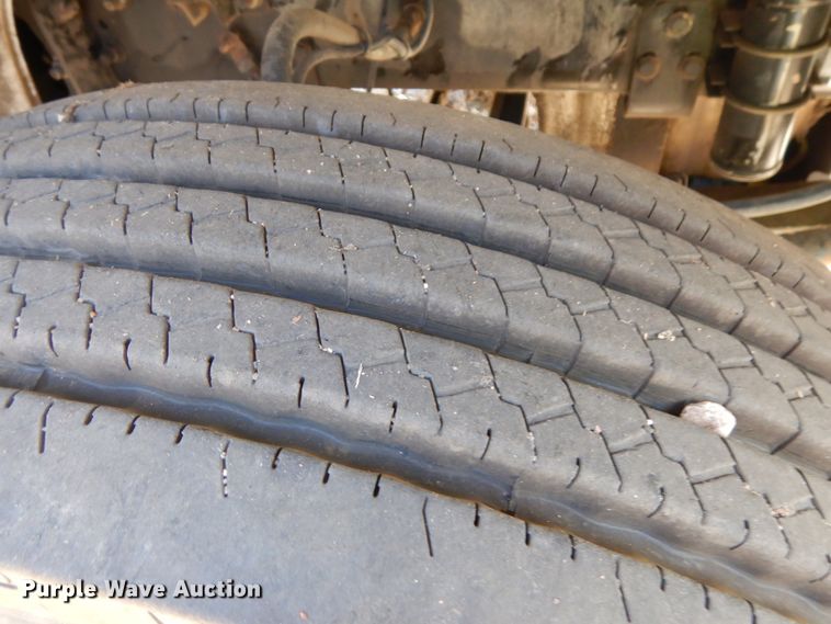 image for item DJ5821 2007 Freightliner Business Class M2  roll-off container truck