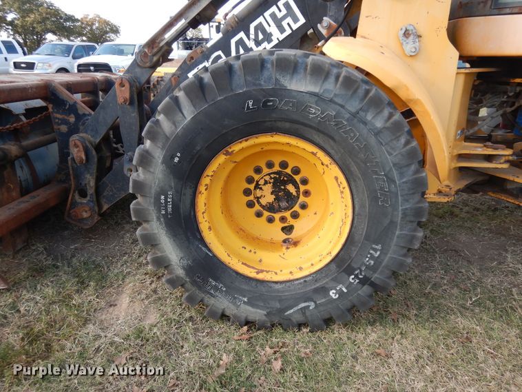 image for item DJ6701 2003 John Deere TC44H  wheel loader