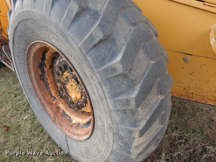 image for item DJ6701 2003 John Deere TC44H  wheel loader