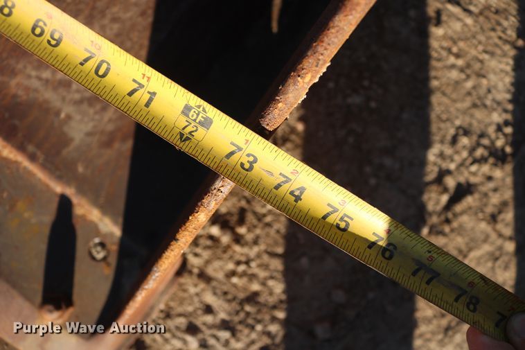 image for item EO9850 Caterpillar 270 73"W skid steer bucket