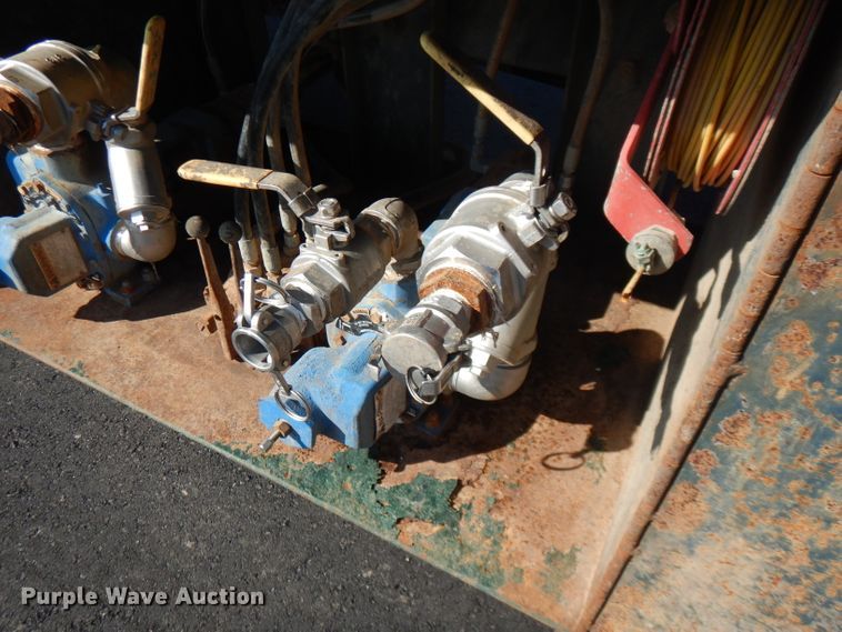 image for item FW9908 2011 Peterbilt 337  flatbed truck with crane