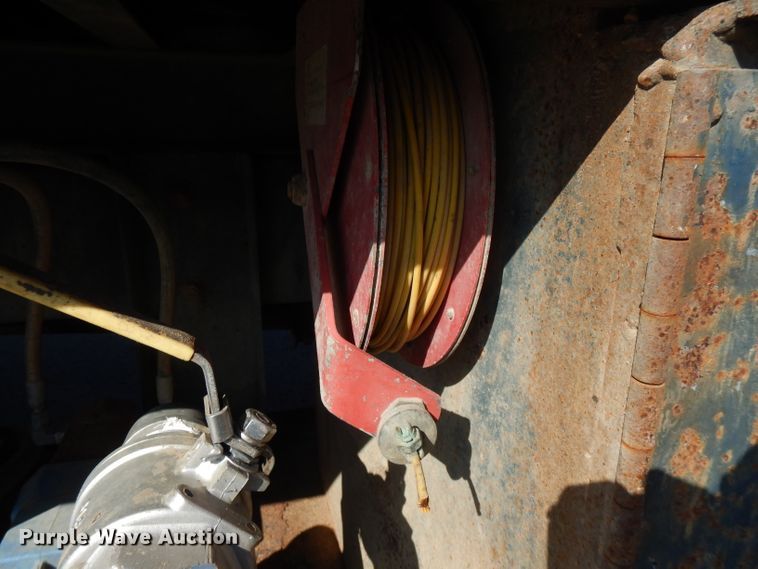 image for item FW9908 2011 Peterbilt 337  flatbed truck with crane