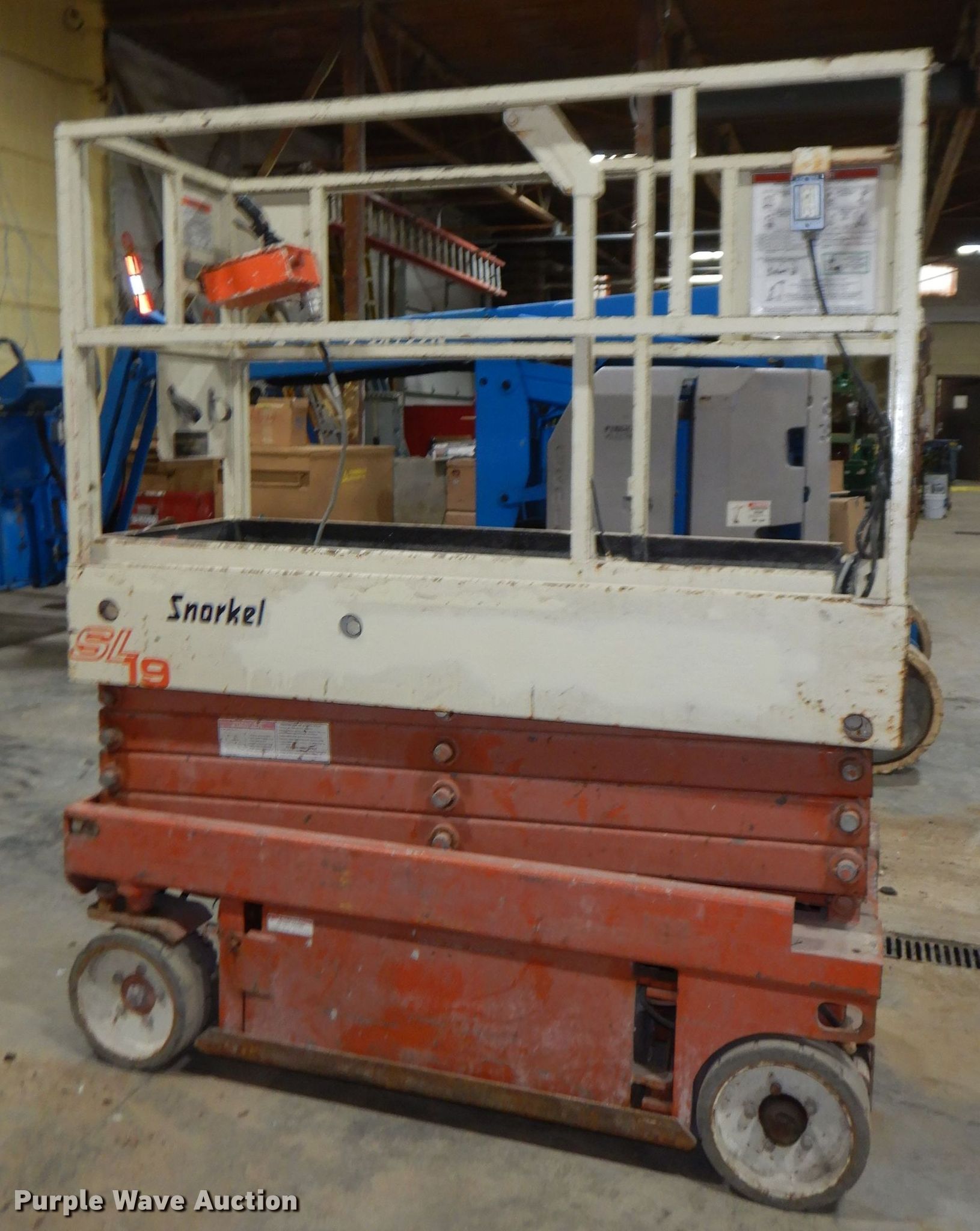 1999 Snorkel SL19 scissor lift in St. Joseph, MO Item HE9263 sold