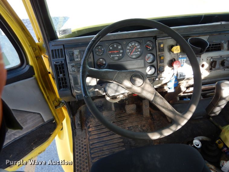 image for item DJ6740 1999 Freightliner FL112  flatbed truck