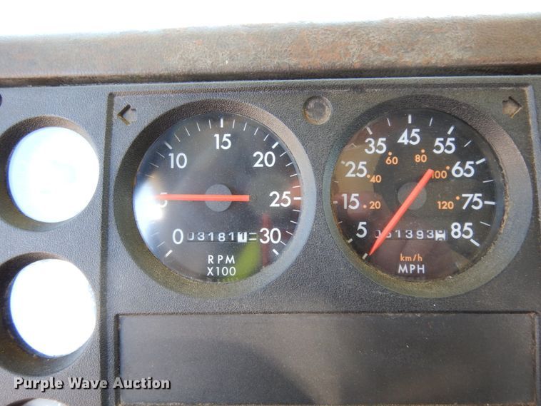 image for item DJ6740 1999 Freightliner FL112  flatbed truck